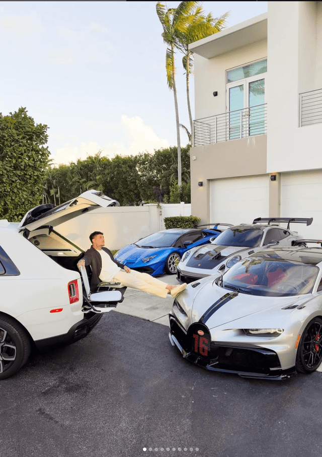 Raul with supercar collection at luxury mansion