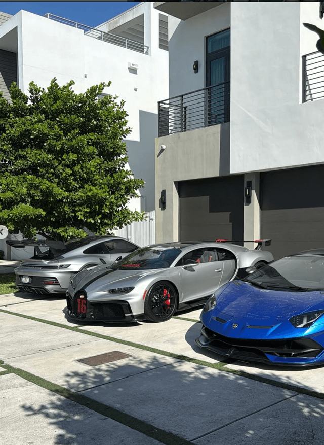 Raul's luxury supercar collection at modern mansion